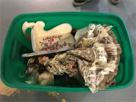 Container of Dolls
