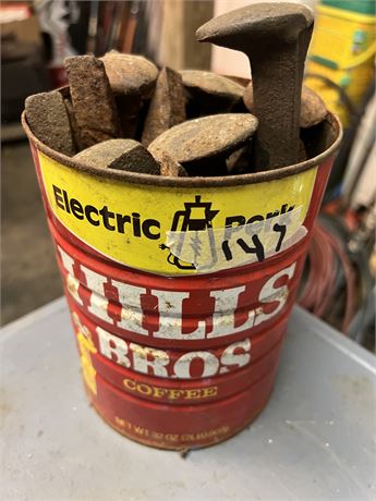can of railroad spikes