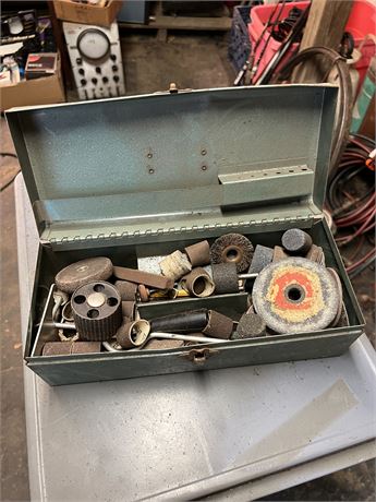 Box of granting and sanding wheels.
