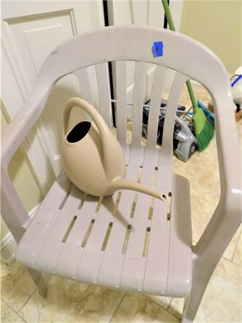 Outdoor Plastic Chair and Watering Can