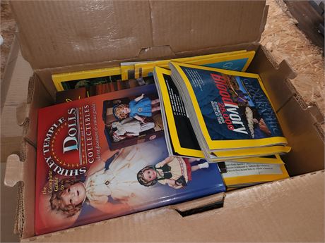 National Geographic Magazines and a book on dolls