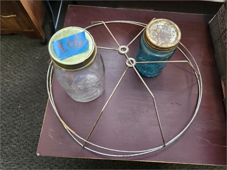 2 mason jars and 2 lamp shade frames