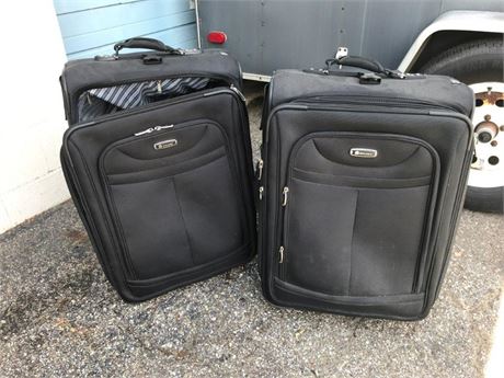 2 Delsey Luggage Bags