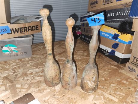 Three wooden beaters