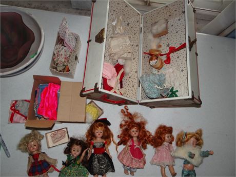 Dolls in Case with Clothes