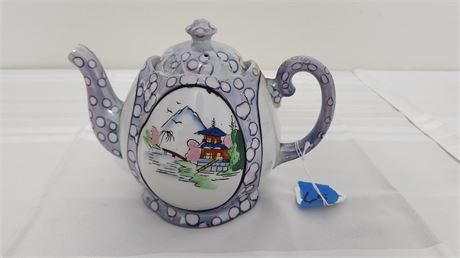 Japanese teapot chipped spout
