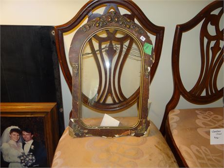 Antique frame and oval glass