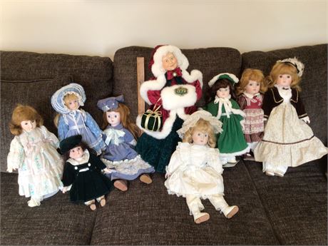Mrs. Claus with 8 Vintage Porcelain Dolls