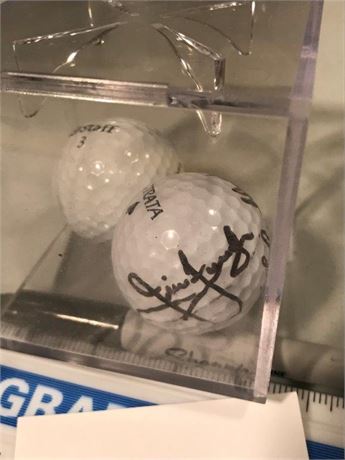 2 Signed Golf Balls