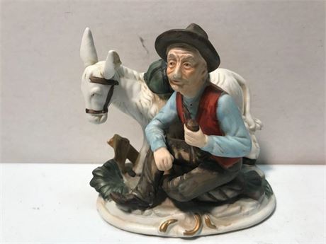 Unmarked Porcelain Statue