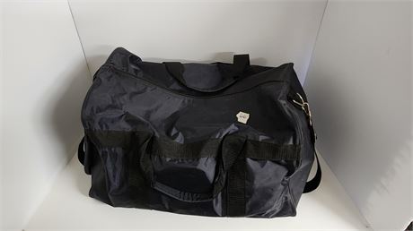 Duffle Bag With Hair Care Items.