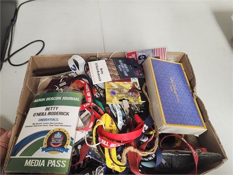 Large box of press passes