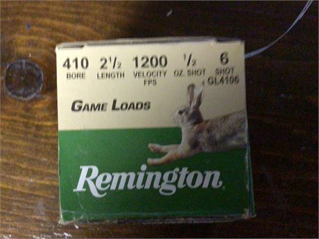 Box of 4-10 Shotgun Shells. 14 Rounds