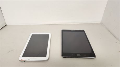 2 Tablets. One Has Damage To Screen NOT TESTED & No Cords