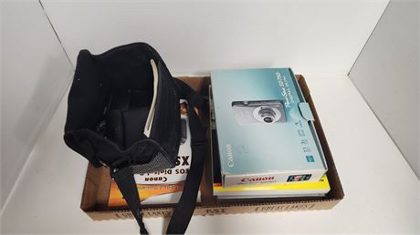 Canon Power Shot SD 750 Camera & Books NOT TESTED