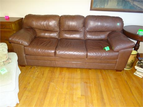 Leather Sofa. Slight Damage to Arms