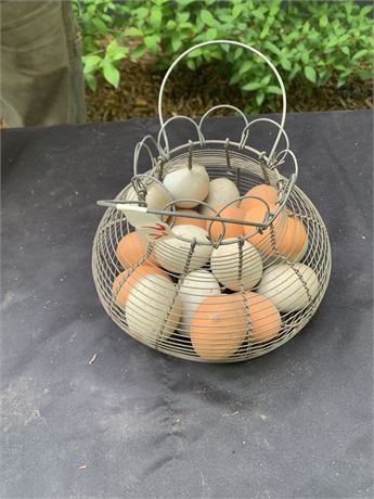Vintage Round Wire Metal Egg Basket Filled With Ceramic Brown And White Eggs