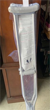 Set Of Silver Crutches With Gray Padded Arms and Hand Grips Never Used