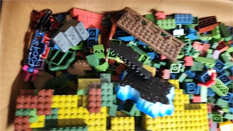 Large Box Of Building Blocks. NOT LEGOS BRAND. Will Fit With Legos