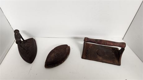Cast Iron Items. 2 Irons & One Bacon Press