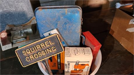 Bucket of sockets and pipe clamp