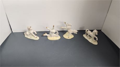 4 Unicorn Statues. One Has A Broken Horn
