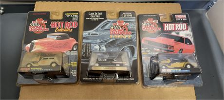 3 Racing Champions Collectible Cars