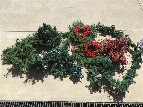 Christmas wreaths and Garland trimmings in large tote