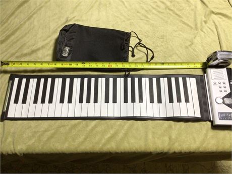 Folding Piano (new batteries)