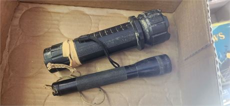 2 Flashlights. One Is A Mini Mag-Lite