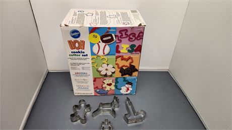 Lot of cookie cutters. Plastic and a couple metal ones.