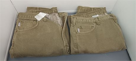 2 Pair Of Carhartt Men's Pants. Size 38x30