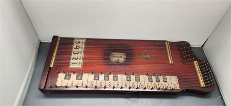Vintage Pianolin & Some Sheets Of Music