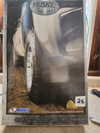 Husky mud flaps for a Nissan Frontier