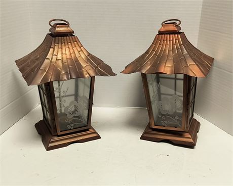 2 Metal Candle Lanterns. One Has Damage To Glass