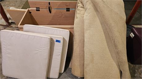 Cushions, carpet roll, folding chairs