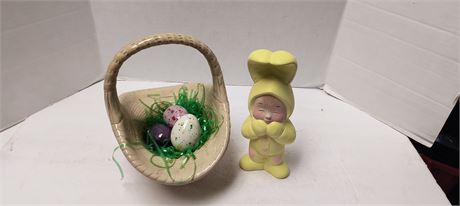 Easter Basket & Eggs Decoration & Child In Easter Bunny Costume Statue