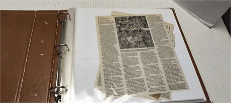 Binder And Vintage Newspaper Articles