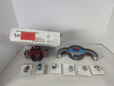 2 Micro Machines play sets with cars
