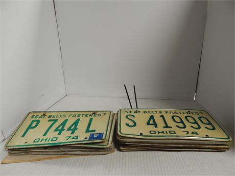 Large lot of vintage license plates