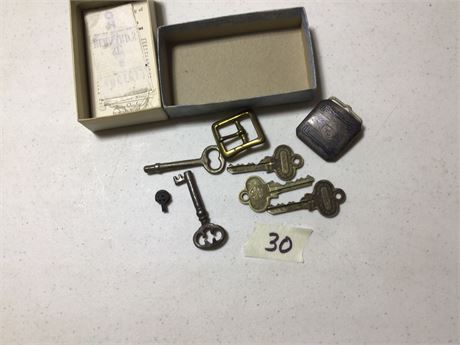 Vintage keys and belt buckles